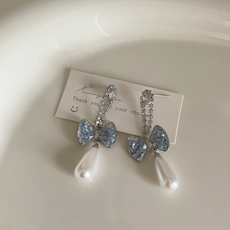 Boucles d'oreilles longues avec nœud papillon/bleu