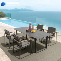 Ensemble table et chaises de salle à manger d'extérieur moderne et durable de haute qualité pour villas de loisirs, jardins et cours