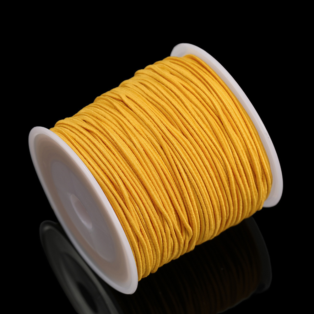 Fil élastique filé à âme jaune