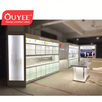 Comptoir de magasin de téléphonie mobile/électronique personnalisé OUYEE OY-MPD074, design en bois MDF, placage, métal, verre trempé, affichage 3 ans