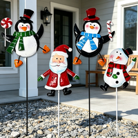 Ensemble fantaisie de 4 décorations de jardin en métal en forme de pingouin, Père Noël, bonhomme de neige et canne à sucre pour extérieur, pelouse et porche