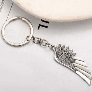 Porte-clés personnalisé rétro en alliage de zinc, style européen et américain, avec pendentif ailes d'ange à plume unique, accessoires de sac, vente en gros - Product Image 2