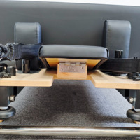 Reformer de Pilates pliable en chêne certifié CE, entièrement personnalisable, machine d'entraînement en bois pour studio de Pilates et usage commercial