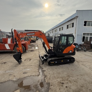 Mini-excavatrice sur chenilles Doosan DX60 d'occasion, moteur Yanmar 2020, 39 kW, godet de 0,22 m, poids en ordre de marche de 5700 kg, bon état, Corée - Product Image 1