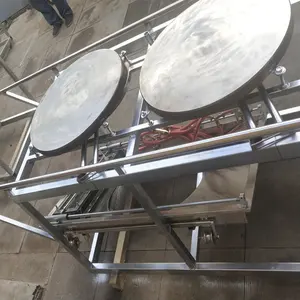 Macchina per pancake a spinta manuale macchina per modellare il pane pita macchina per pancake piatta sottile