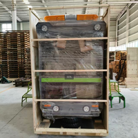 Balayeuse autoportée robuste à double brosse pour entrepôts logistiques
