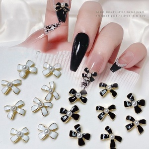 Perles en alliage 3D, nœud papillon, Style Simple, breloques pour Nail Art, arc <span class=keywords><strong>noir</strong></span> et blanc, 7x9mm, nœud papillon, <span class=keywords><strong>strass</strong></span> pour ongles, bricolage, Design de <span class=keywords><strong>manucure</strong></span> - Product Image 2