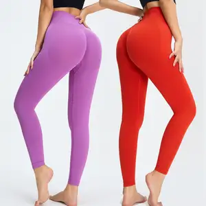 Venta caliente Mujeres sin costuras Color sólido Levantamiento de glúteos Fitness Wear Compresión Tight Slim Cintura alta Running Leggings Yoga Pant