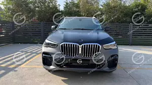 E70 إلى G05 لـ BMW X5 E70 ترقية G05 MT طقم جسم مصدات غطاء رأس صندوق السيارة قديم إلى جديد E70 إلى M sport G05 مصابيح أمامية