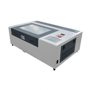 เครื่องแกะสลักและตัดด้วยเลเซอร์ CO2 แบบพกพา รุ่น 3020 มินิ พร้อมมอเตอร์กำลังไฟ 100 วัตต์ แรงดันไฟฟ้าคู่ 220V/110V - Product Image 1