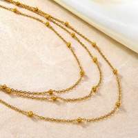 Collier triple multicouche en chaîne perlée en acier inoxydable avec perles espacées, accessoires féminins modernes pour usage quotidien, vente en gros TGXL14738