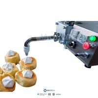 Machine d'injection de crème, pâte, confiture et sauce chocolat de haute qualité pour la garniture des puffs, churros, puddings, gâteaux et croissants