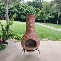 Foyer Chiminea en argile à face solaire de style mexicain avec pieds en métal pour chauffage extérieur