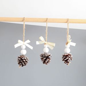 Ornement suspendu en forme de cône de pin en bois de Noël avec perles blanches et ruban, décoration de style rustique pour arbre ou décoration intérieure - Product Image 1