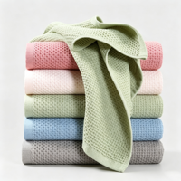 Serviettes de toilette douces multicolores en coton gaufré léger, personnalisables, pour hôtels, spas et chambres d'hôtes (vente en gros)