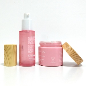 ขวดแก้วทรงแบนสีชมพูแบบกำหนดเองขนาด 1 ออนซ์ พร้อมหลอดหยด 30 มล. 50 มล. สำหรับบรรจุเซรั่มบำรุงผิวหน้า น้ำมันหอมระเหย บรรจุภัณฑ์สำหรับผลิตภัณฑ์ดูแลผิว พร้อมบริการสกรีนพิมพ์ - Product Image 3