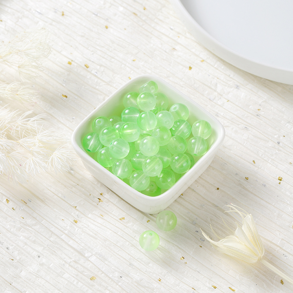 Perles de verre bicolores - vert et blanc