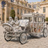 Calèche de mariage électrique royale avec décorations de figurines dorées jumelées pour hôtels, zones scéniques et services de transport événementiel