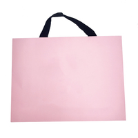 Bolsa de papel rosa de lujo, bolsas de regalo de papel para ropa, embalaje de bolsa de papel personalizado de buena calidad