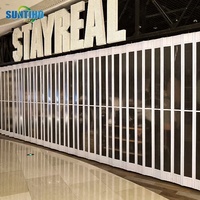 Centre commercial intérieur simple avec moteur cloison porte PC cristal porte pliante en alliage d'aluminium porte coulissante latérale
