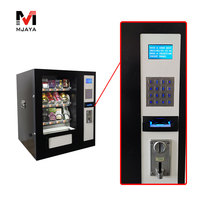 Distributeur automatique de mini-snacks, boissons et préservatifs avec accepteur de pièces, lecteur de billets et de cartes de crédit MDB/DEX
