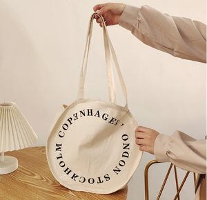 Sac fourre-tout en toile de coton Tian-YL en gros, forme ronde, durable, tissu lourd de 16 oz, logo personnalisé, fermeture éclair, fermeture à l'épaule, moyen - Product Image 5