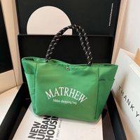 Nouveau Sac à langer élégant en nylon de style japonais, inspiré des influenceurs, ambiance dopamine, minimaliste, avec lettrage, grande capacité et fermeture magnétique, collection 2025