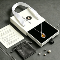Boîte à bijoux recyclable haut de gamme personnalisée avec tiroir coulissant et logo, pelliculage mat et revêtement UV - Pour bagues et colliers