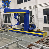 Robot de soudage industriel Yaskawa à 6 axes, PLC, vision 3D, poste de soudage en suspension à bras articulé MIG, charge utile de 1200 kg, 0,03 mm
