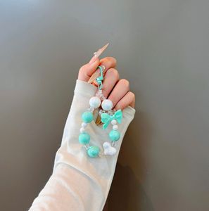Simpatico Portachiavi con Ciondolo a Forma di Bambola Cartoon, Catena per Telefono con Perline, Regalo Creativo di <span class=keywords><strong>Natale</strong></span>, Accessorio alla Moda in Plastica per Custodia del Telefono/Borsa - Product Image 6