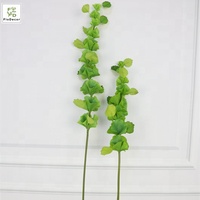 Vente en gros de tiges de verdure artificielle au toucher réel, feuilles de clochettes d'Irlande (Moluccella laevis Pall.) pour la décoration de table d'hôtel