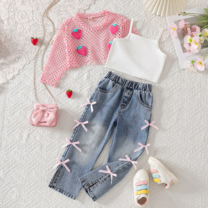 Nouvel ensemble trois pièces printemps/été 2026 pour filles européennes et américaines : haut ajouré + jean à nœud papillon - Product Image 1