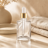 Flacon compte-gouttes carré en verre transparent à base épaisse 30ml 50ml, emballage cosmétique avec compte-gouttes en caoutchouc noir