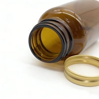 Bouteille en verre ambré avec bouchon à vis en aluminium et couvercles métalliques pour comprimés et capsules, avec scellage par induction thermique – Approvisionnement direct usine