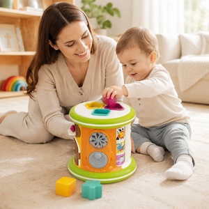 Tambour d'activités pour bébé, jouet musical d'apprentissage Montessori, jouet d'exploration sensorielle avec tri de <span class=keywords><strong>formes</strong></span> et développement de la motricité fine - Product Image 1