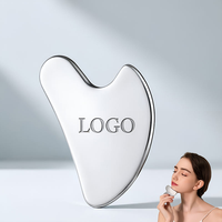 Outil de massage facial en métal Gua Sha, grattoir Guasha en acier inoxydable pour le lifting du visage