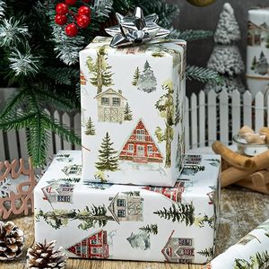Papel de regalo original con diseño navideño en acuarela de casita y árbol de Navidad, impreso en cobre. - Product Image 1