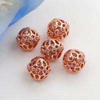 Accessoires de fabrication de bijoux en argent plaqué or cuivre creux rond fleur entretoise pour femmes collier bracelet