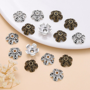 Cuentas espaciadoras de aleación de zinc con forma de flor pequeñas para hacer pulseras, mezcla de plata antigua y bronce, accesorio de joyería DIY - Product Image 1