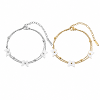 Chaîne de cheville double couche en acier inoxydable 304 plaqué or avec pendentif fleur de coquillage pour femme