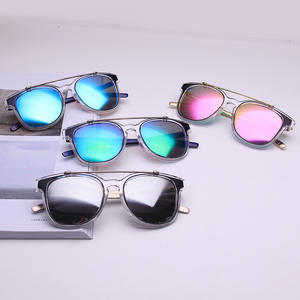 Gafas de Sol Qianai con Marco Transparente, Lentes Azules Reflectantes, Protección UV para Mujer, Diseño Ovalado Retro y Moderno - Product Image 1