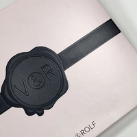Bon prix Boîte de papier d'emballage en carton pliant élégant gaufrage logo avec conception personnalisée