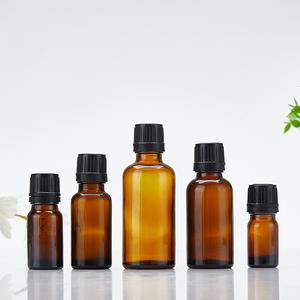 Vente en gros rechargeable 15ml 50ml 100ml bouteille cylindrique en verre de Boston bouteille en verre d'huile essentielle cosmétique ambre avec couvercle à vis - Product Image 2