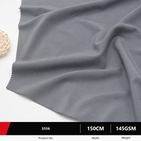 Tissu tricoté chaîne 100 % polyester extensible de qualité supérieure, poids moyen, pour pantalons et vestes matelassées, couleurs et largeurs personnalisées, utilisation extérieure et automobile