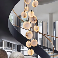 Projet personnalisé Métal Céramique Intérieur Or Décoration Lobby Plafonnier Restaurant de luxe Lampes d'escalier Suspension Led