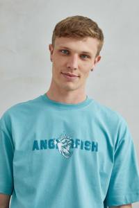 T-shirt Unisex in cotone oversize con pescatrice verde Piranha t-shirt da uomo - Product Image 3