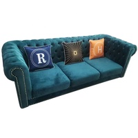 Canapé sectionnel Chesterfield en velours bleu avec pieds dorés et boutons