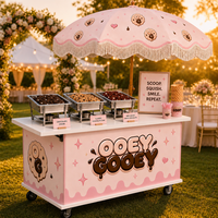 Chariot à desserts mobile personnalisé avec parasol à franges, chariot à biscuits et bonbons sur roues, stand de présentation extérieur pour événements de mariage