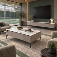 Ensemble meuble TV et table basse WYRAX Train Lounge avec dessus aspect marbre, tiroirs dissimulés, panneaux décoratifs cannelés et pieds fins