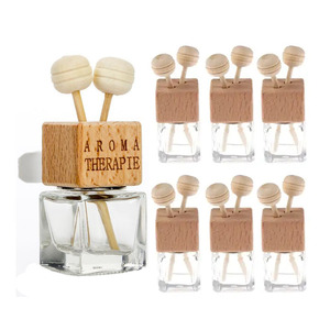 Diffuseur de parfum en verre 8 ml pour voiture avec bouchon en bois et clip de fixation pour grille d'aération - Product Image 1